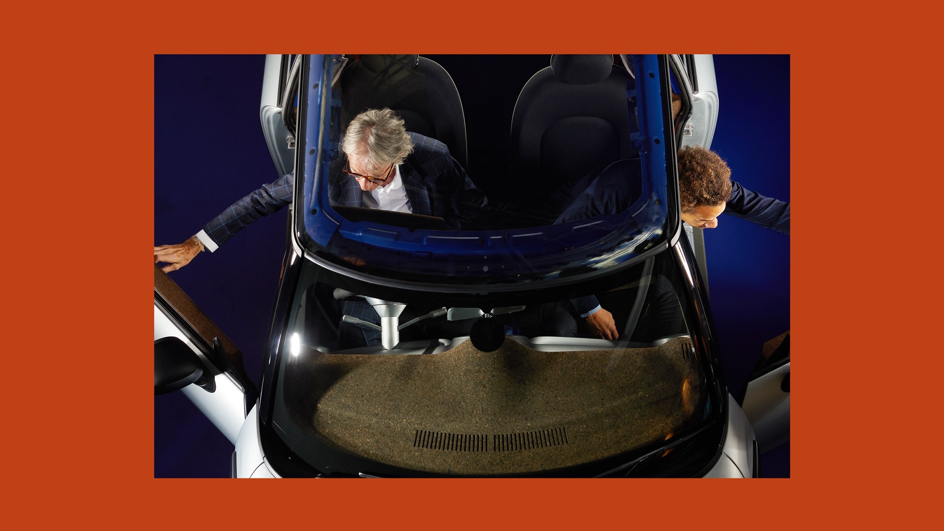 Paul Smith and Oliver Heilmer getting into the car